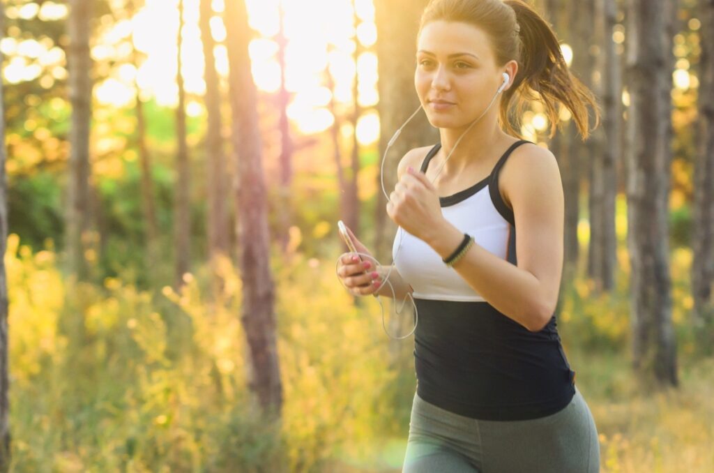 woman running with headphones