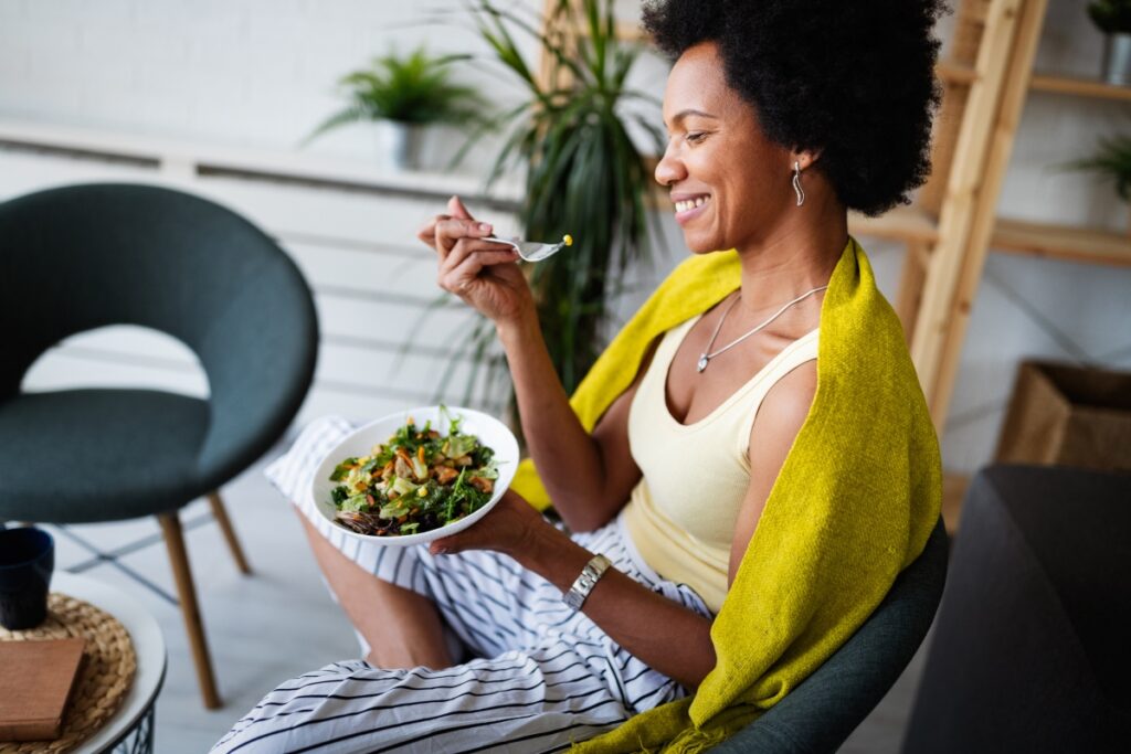 woman eating healthy salad