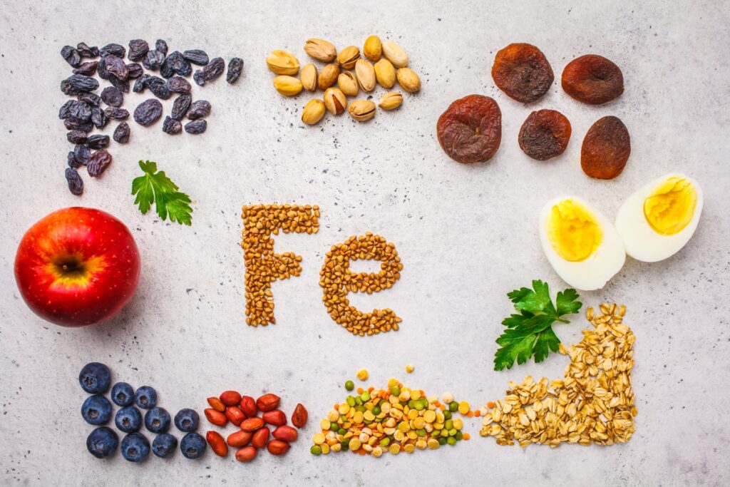 Iron rich foods like apple, eggs, oats, blue berries, beans and rainsins spelling F E (the chemical sign for iron)
