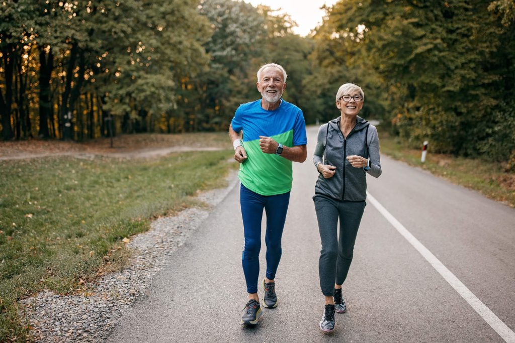 Bioptimized elder couple jogging together