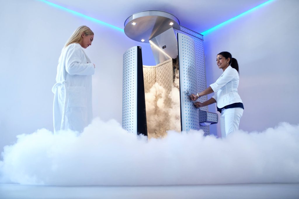 Portrait of woman going for cryotherapy treatment in cryosauna booth