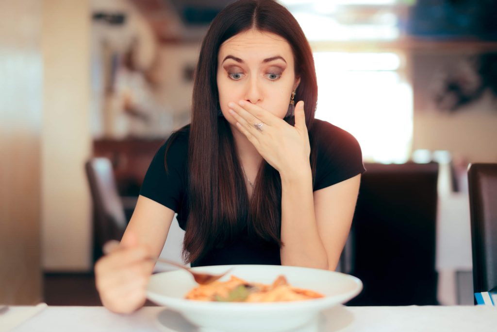 Woman having a bad experience feeling sick