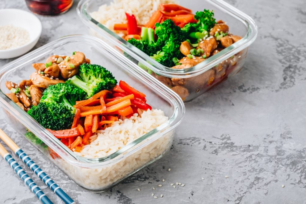 Chicken teriyaki stir fry meal prep lunch box containers with broccoli, rice and carrots