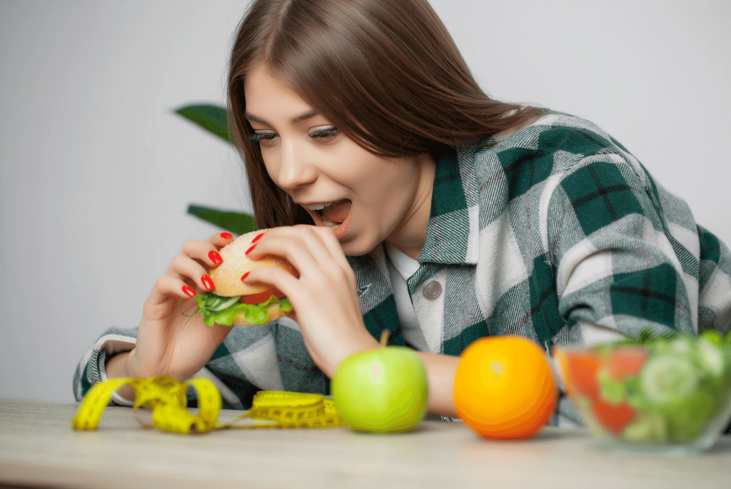 Woman eating a burger 