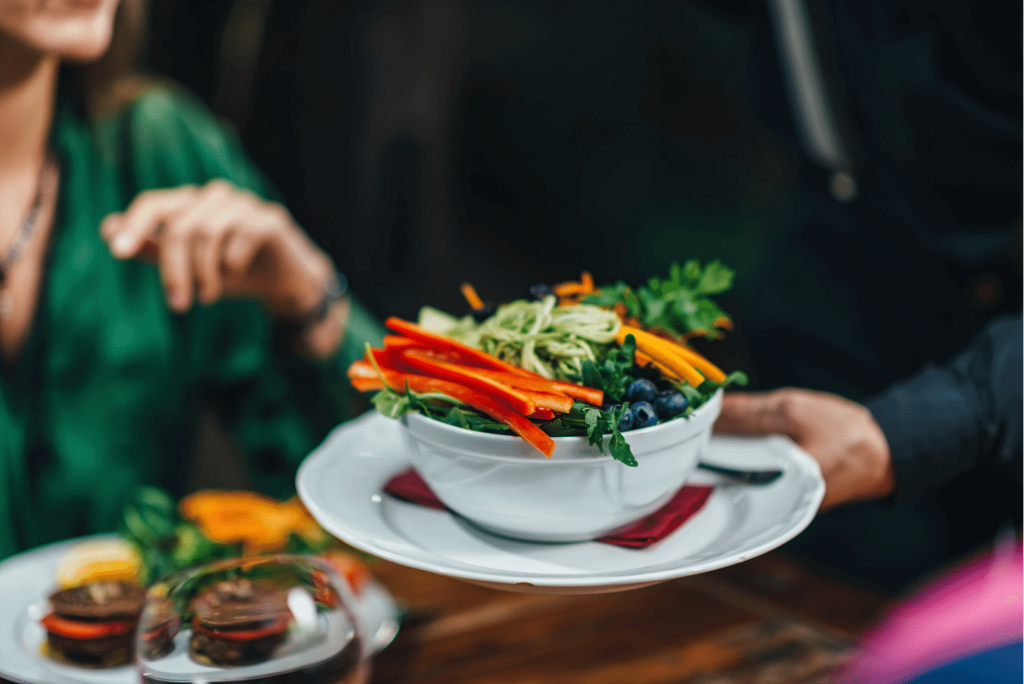 serving a colorful salad 