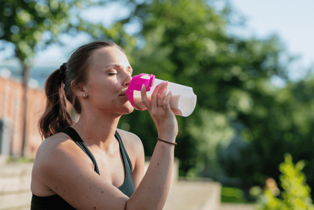 woman drinking protein shake 