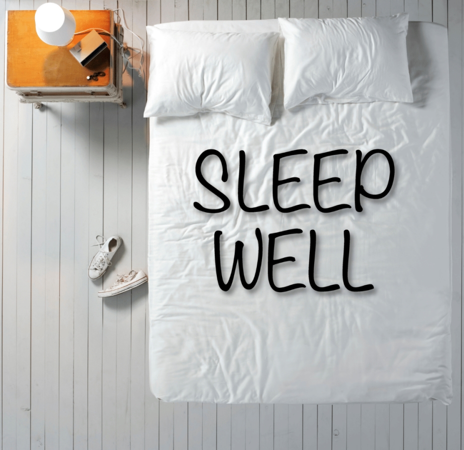 Sleep well written in a bed