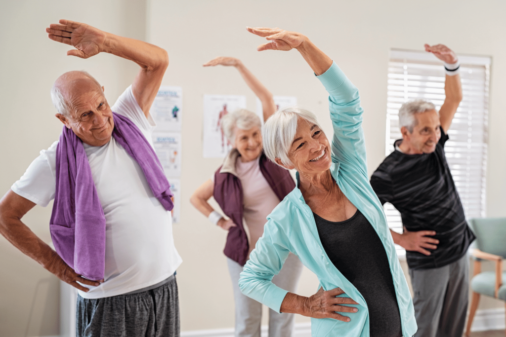 group of elderly in a stretching class