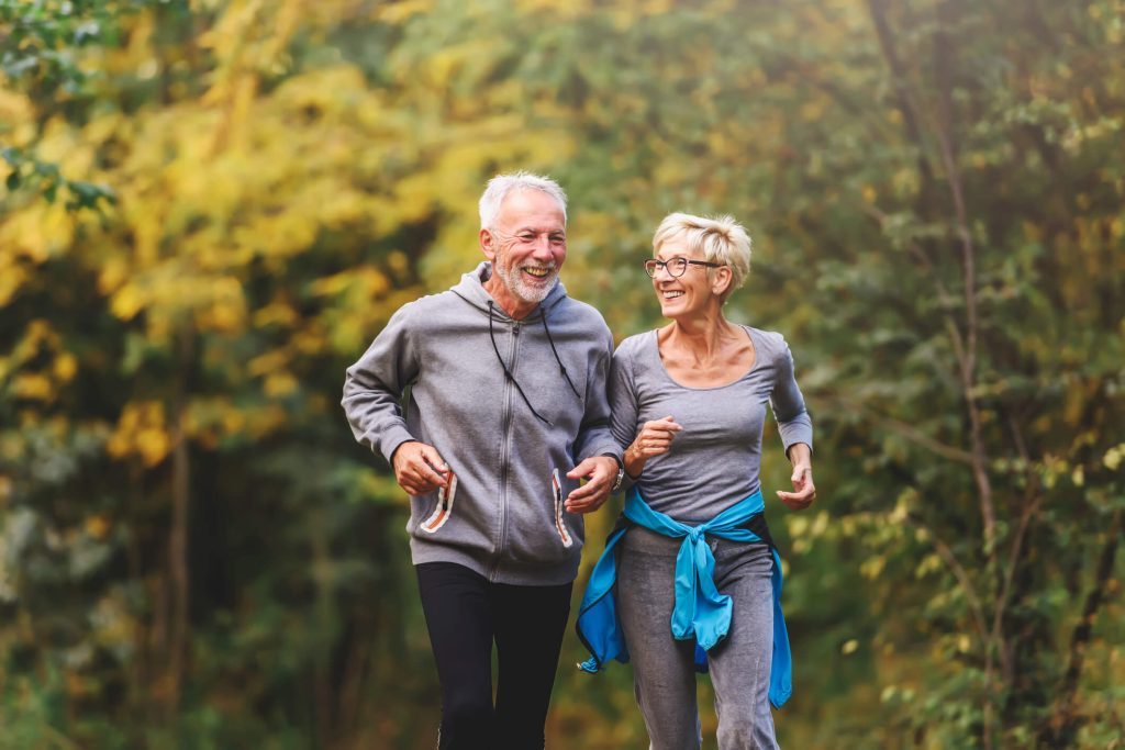 elder couple jogging