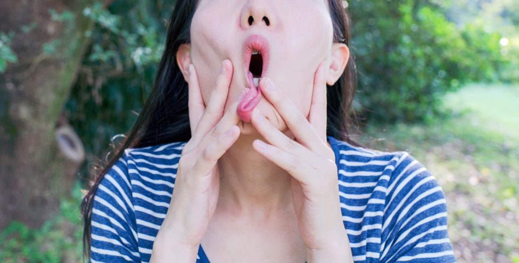 girl opening mouth