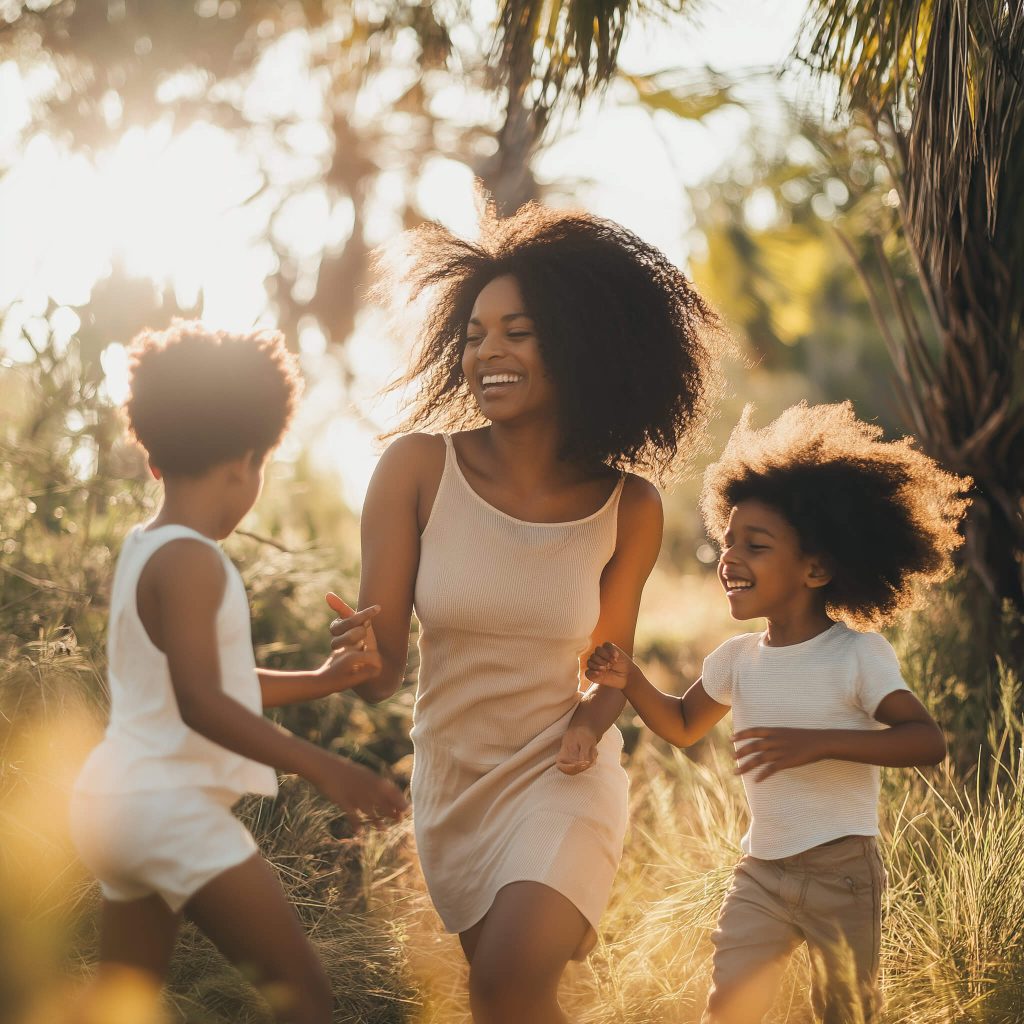 portrait of an afroamerican woman with children running 