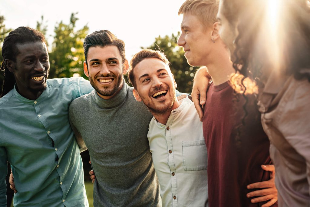 group of young man smiling 