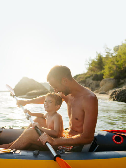 father and son kayaking