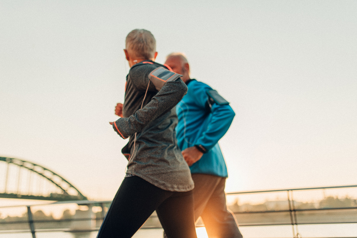 Senior couple jogging together