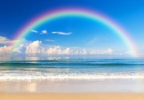 Beautiful sea with a rainbow in the sky. Karon beach Phuket Thailand, Asia