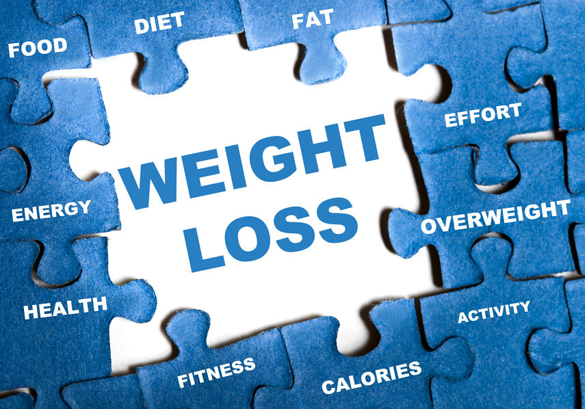 Weight loss blue puzzle pieces assembled